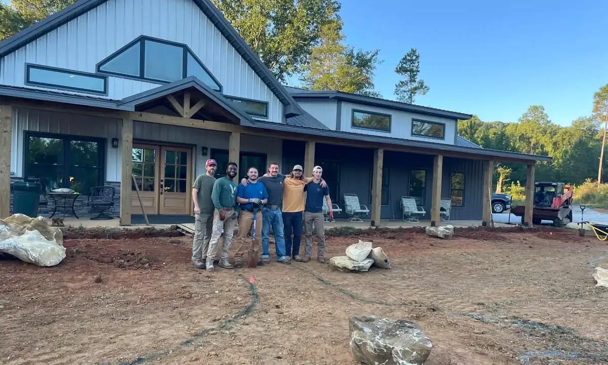 Field crew standing together at a large residential project